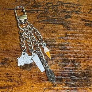 Exclusive Dieux Skincare Charm Keychain – Limited Brand Merch